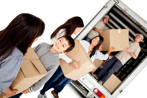 Professional movers from Ben Removalists handling household items