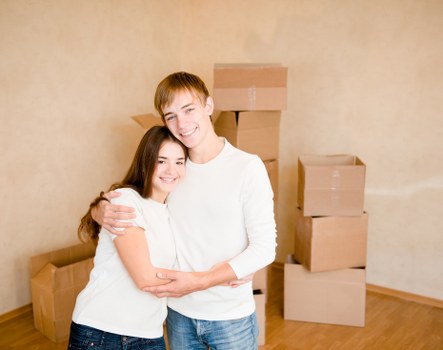 A team of removalists packing items securely