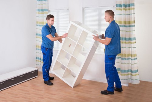 Furniture being loaded into a removalist truck by Ben professionals